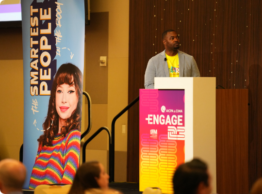 man standing beside stage